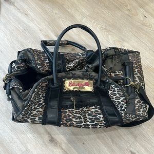 Betseyville rolling duffel bag